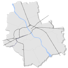 Mapa konturowa Warszawy, blisko centrum u góry znajduje się punkt z opisem „Warszawa Zoo”