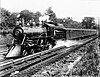 The Empire State Express takes on water from a track pan in 1905