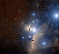 Spectaculaire image de la région entourant la nébuleuse de la Flamme. La célèbre nébuleuse de la Tête de Cheval est située à proximité de NGC 2024.