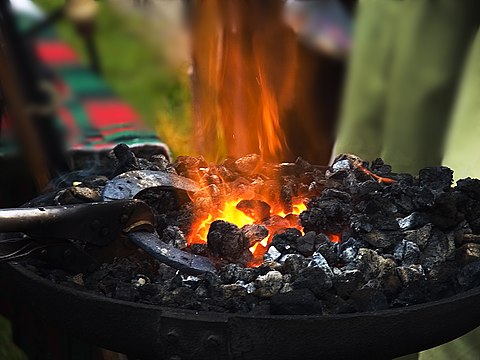 A hot horseshoe in a forge