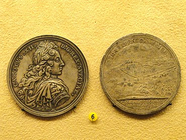 Medaille mit dem Porträt von Karl XII. von Schweden sowie Ansicht der Schlacht bei Narva im Jahr 1700