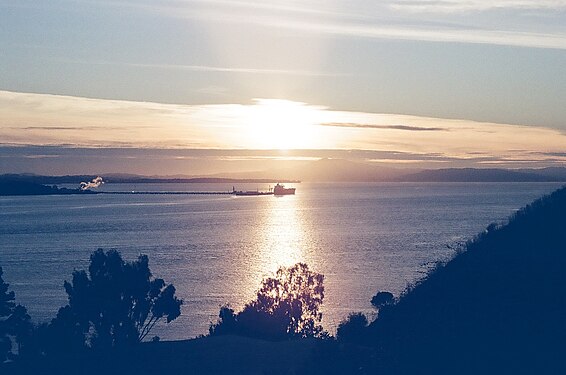 Sunset photo showing a tanker while docked at the Conoco Phillips 66 Refinery