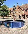 Klosterbrunnen mit Wappen von Herzog Ludwig Eugen