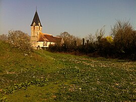 The church in Bailleul with the motte in foreground