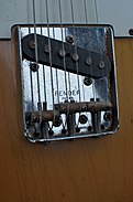 Telecaster bridge showing three independently adjustable saddles and bridge pickup