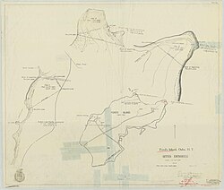 A hand-drawn map depicting Ford Island with three sections drawn in a larger scale. Clear tape covers parts of the map.