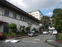 The old municipal hall of San Juan, with the San Juan Medical Center in the background. No longer existing. It was replaced with front extension of San Juan Medical Center.