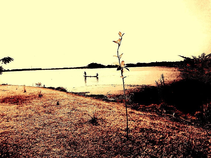 File:Boat on a lake.jpg