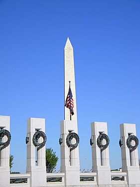 Five state pillars and flag