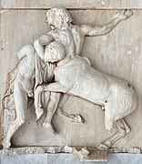 Sculpture of a man fighting a centaur.