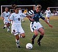 Image 3Mia Hamm (left) battles with German defender Kerstin Stegemann (from Women's association football)