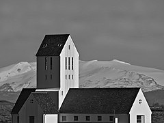 Hekla Volcano behind Skaholt Cathedral (30913419367).jpg