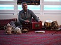 Image 15Elements of Afghan culture including: tabla and harmonium musical instruments, an GhaderKooni, teapot, and sheer pira dessert (from Culture of Afghanistan)