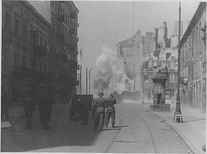 IPN copy #37 Fight against a resistance pocket Cannon on Zamenhofa Street shooting North at resistance in Gęsia 20 building.