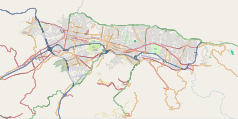 Mapa konturowa Caracas, blisko dolnej krawiędzi znajduje się punkt z opisem „Baruta”