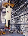 The S-IC first stage of the Apollo 8 Saturn V being erected in the Vertical Assembly Building on February 1, 1968