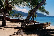 Boats at the beach of Nosy Komba, Madagascar.jpg