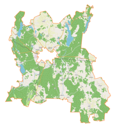 Mapa konturowa gminy wiejskiej Szczytno, blisko centrum na prawo u góry znajduje się punkt z opisem „Wikno”