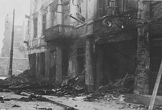 NARA copy #50, IPN copy #47 (No image caption, in section This is how the former Ghetto looks after having been destroyed) On the right Nalewki 31/Gęsia 2, and on the left a view South at Nalewki Street towards ghetto gate at Nalewki/Gęsia/Franciszkańska intersection.