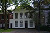 Neoclassicistisch gepleisterd statig herenhuis