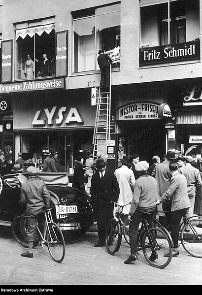 File:Judenboykott 1933-04 Anti-Semitic Nazi boycott of Jewish businesses shops Berlin SA Sturmabteilung propaganda terror action Anti-Jewish poster ladder Fritz Schmidt clothing store Kauft nicht bei Juden Narodowe Archiwum Cyfrowe 3 1 0 17.jpg