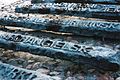 Close up of the railway sleepers showing the names of outposts of the Gulag like Archangielsk