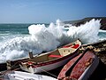 Some boats on land