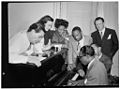 Tadd Dameron, Hank Jones, Dizzy Gillespie, Milt Orent. In Mary Lou Williams' apartment, NYC, ca. August 1947.