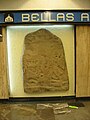 Replica of gravestone located in Metro Bellas Artes in Mexico City. The accompanying plaque translates to "Gravestone of Izapa – Mayan Culture – Preclassic Period – Description: Bas relief from Izapa, Chiapas depicting the decapitation of someone."