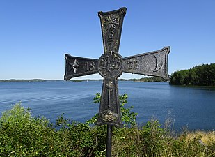 Ordensenblem med vy över Gripsholmsviken.