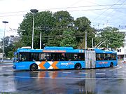 Articulated Arnhem trolleybus demonstrating its four-wheel steering on front and rear axles (2006).