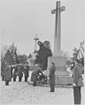 Field Marshal Harold Alexander laying a wreath at the Canadian Cross of Sacrifice in 1947