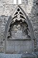 a late gothic canopy tomb in a niche of the wall