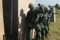 Uruguayan soldiers training CQB sitatiions, armed with FN FALs