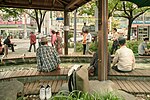 Thumbnail for File:People take a foot bath at an outdoor public hot spring in Yuseong-gu, Daejeon, Korea.jpg