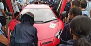 Thumbnail for File:Students looking at a Lamborghini Aventador SVJ.jpg