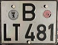 Older german plate at a motorcycle