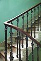 Main staircase. The staircase goes not just to the first floor but to the top of the house. It has iron balustrades, these are a feature of many Regency homes in Brighton. Brighton produced much cast iron.[1]