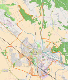 Mapa konturowa Oławy, blisko centrum na dole znajduje się ikonka pałacu z opisem „Zamek Piastowski w Oławie”