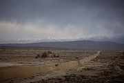 The Great Wall near Jiayu Pass, Qilian Mountains in behind