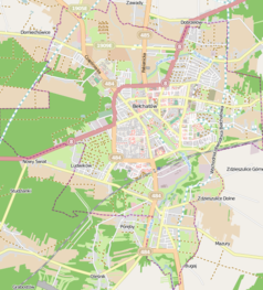 Mapa konturowa Bełchatowa, blisko centrum na prawo u góry znajduje się punkt z opisem „GIEKSA Arena”