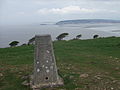 Trig Point på Brean Down med Weston super Mare og Birnbeck Pier i bakgrunnen