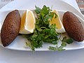 "Oruk" or içli köfte, bulgur patties with ground meat and walnuts inside