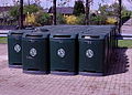 Containers for newspapers for recycling.