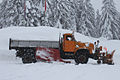 e Laschtwage Saurer mit Schneepflueg im Tessiin