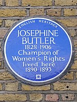 Circular blue plaque with the words "Josephine Butler / 1826–1906 / Champion of / Women's Rights / lived here / 1890–1893"