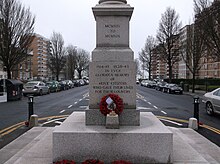 Black lettering inscribed on smooth stone