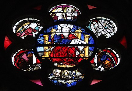 Center of the south rose window by André Robin (1451), depicting Christ in Majesty, surrounded by angels musicians, Old Men of the Apocalypse, and signs of the Zodiac