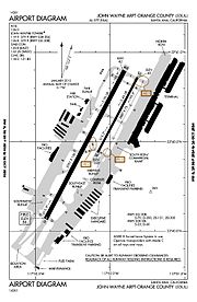 A map with a grid overlay showing the terminals runways and other structures of the airport.