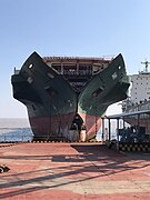 Ship beached in recycling facility in India.jpg